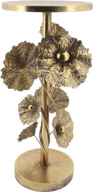 Столик приставной из металла и украшенный цветочной композицией на основании