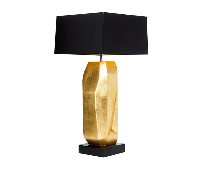 Настольная лампа золотого цвета с черным абажуром