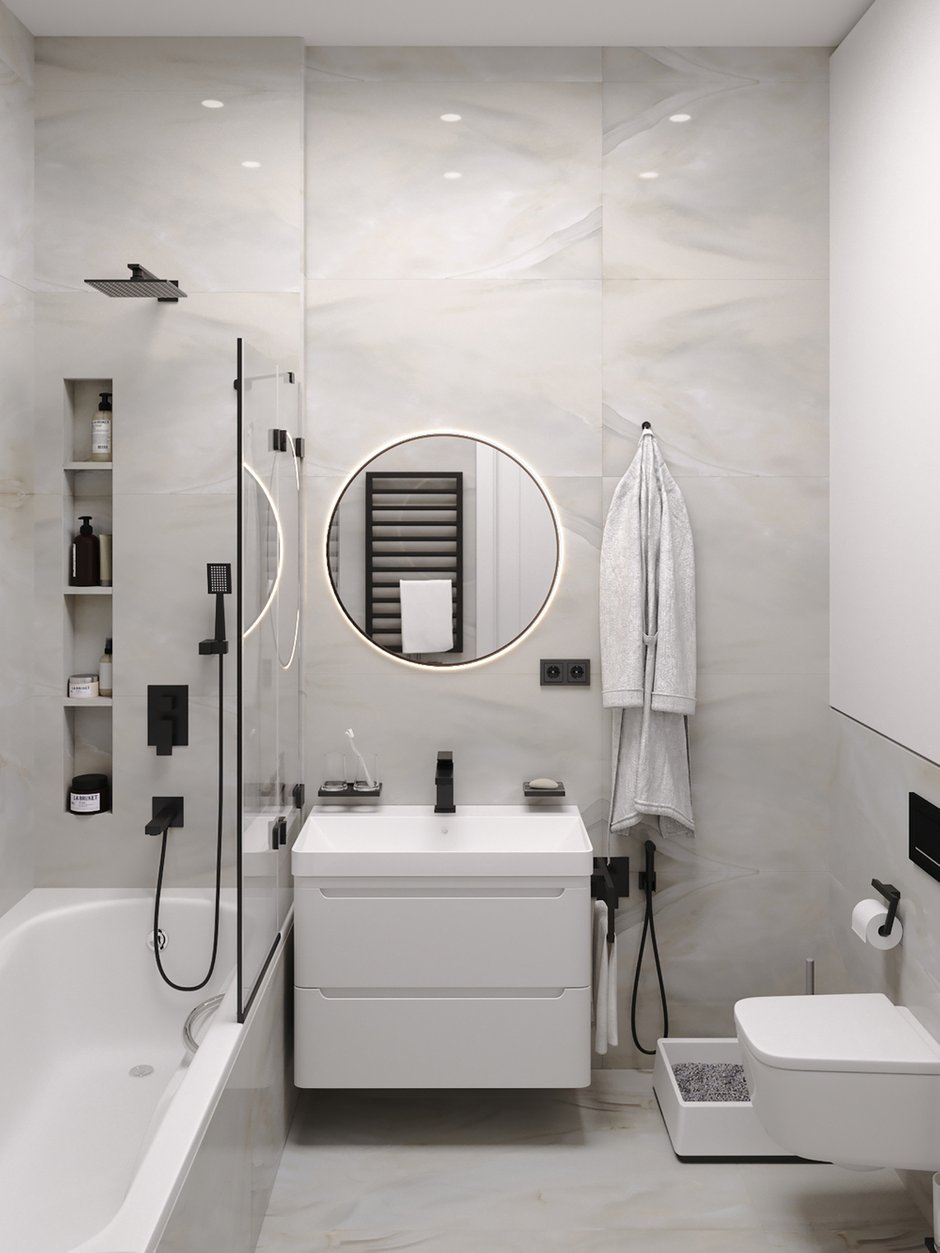 В гостевом санузле предусмотрены встраиваемая ванна 180×80 см, небольшая тумба с раковиной, зона постирочной, унитаз, гигиенический душ, а также  кошачий лоток.
